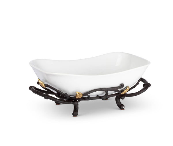 White stoneware serving bowl with metal gold leaf base