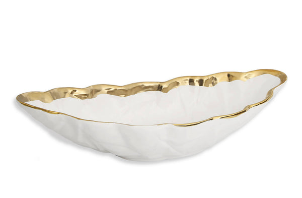 White porcelain leaf shaped bowl with gold border